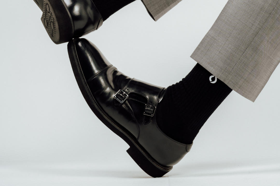 Black DryStep Mid-Crew socks with black double monk strap shoes and grey suit trousers