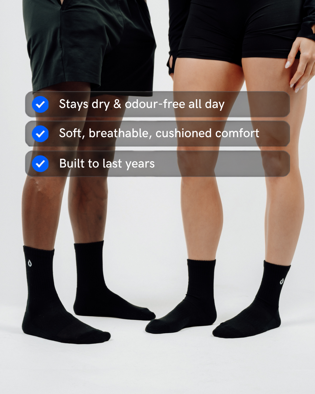 Black mid-crew socks with three ticks, stays dry and odour-free, cushioned, built to last