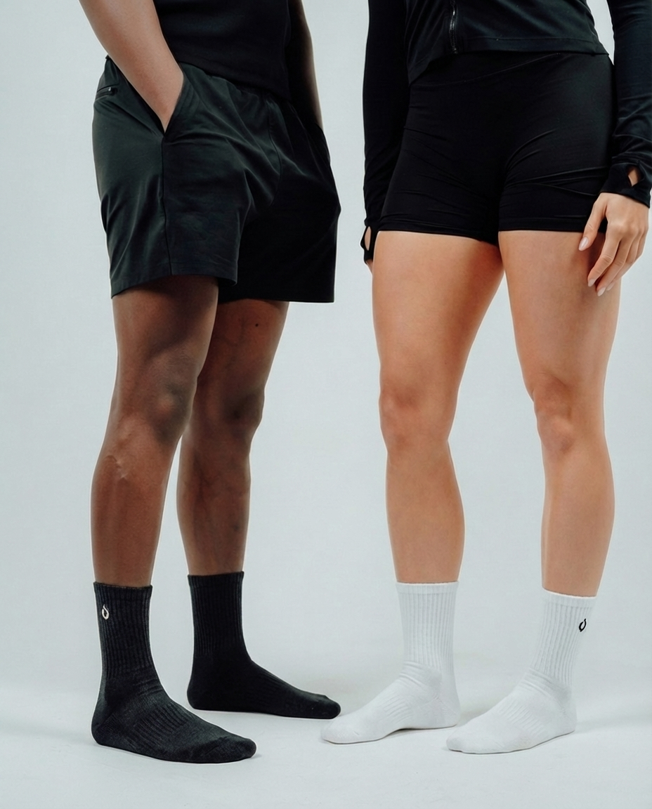 DryStep black and white mid crew socks on foot — versatile office to gym performance sock