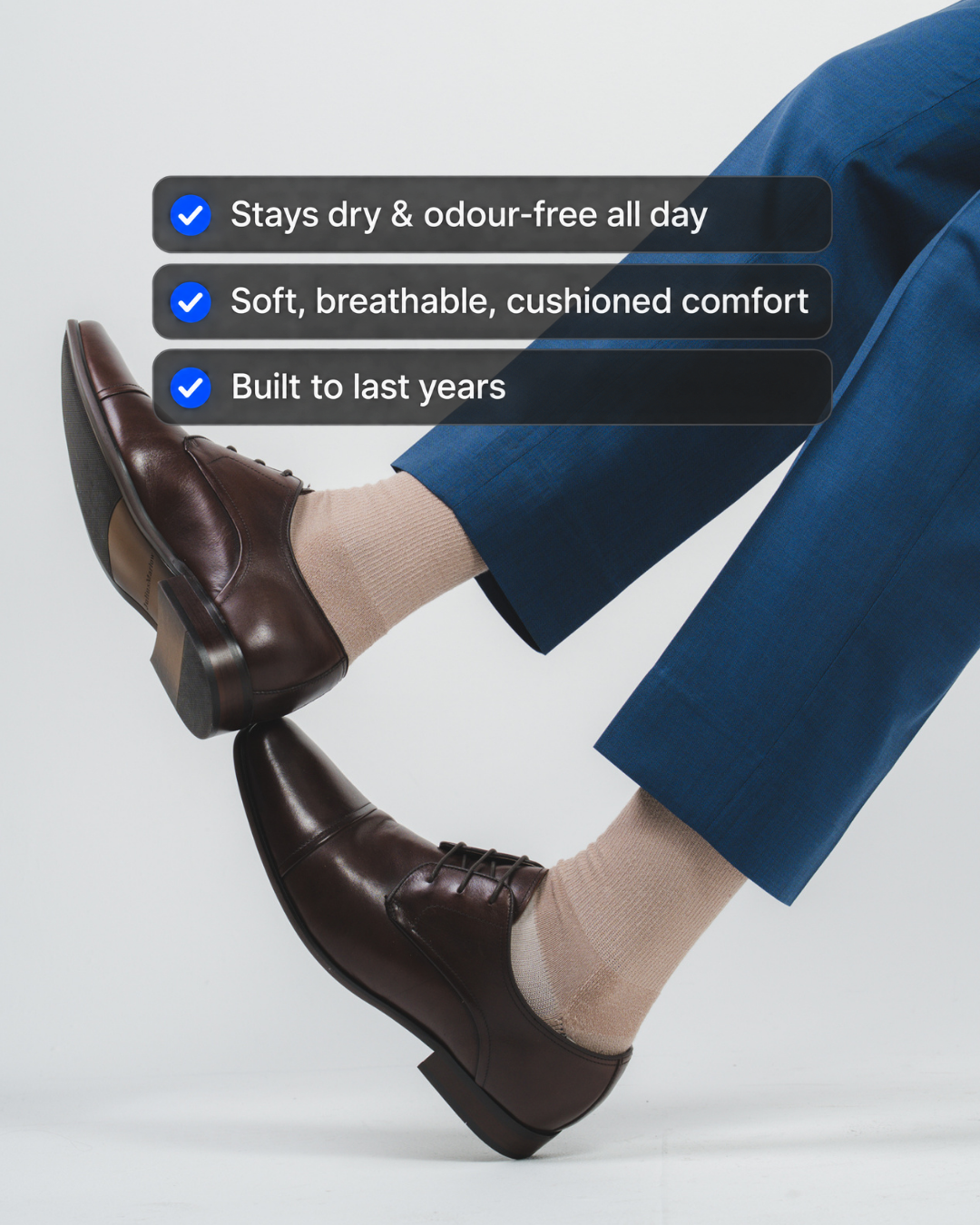Man wearing DryStep light mocha crew socks at office — versatile everyday performance sock