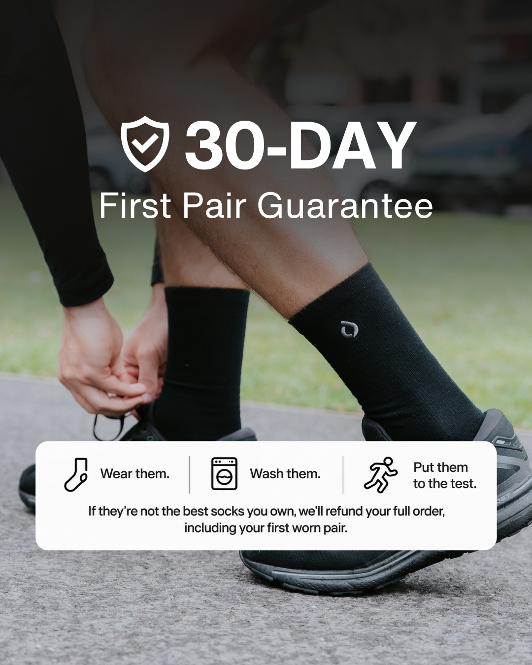 Man running in DryStep black crew socks — sweat-wicking cushioned performance sock with 30-day first pair guarantee