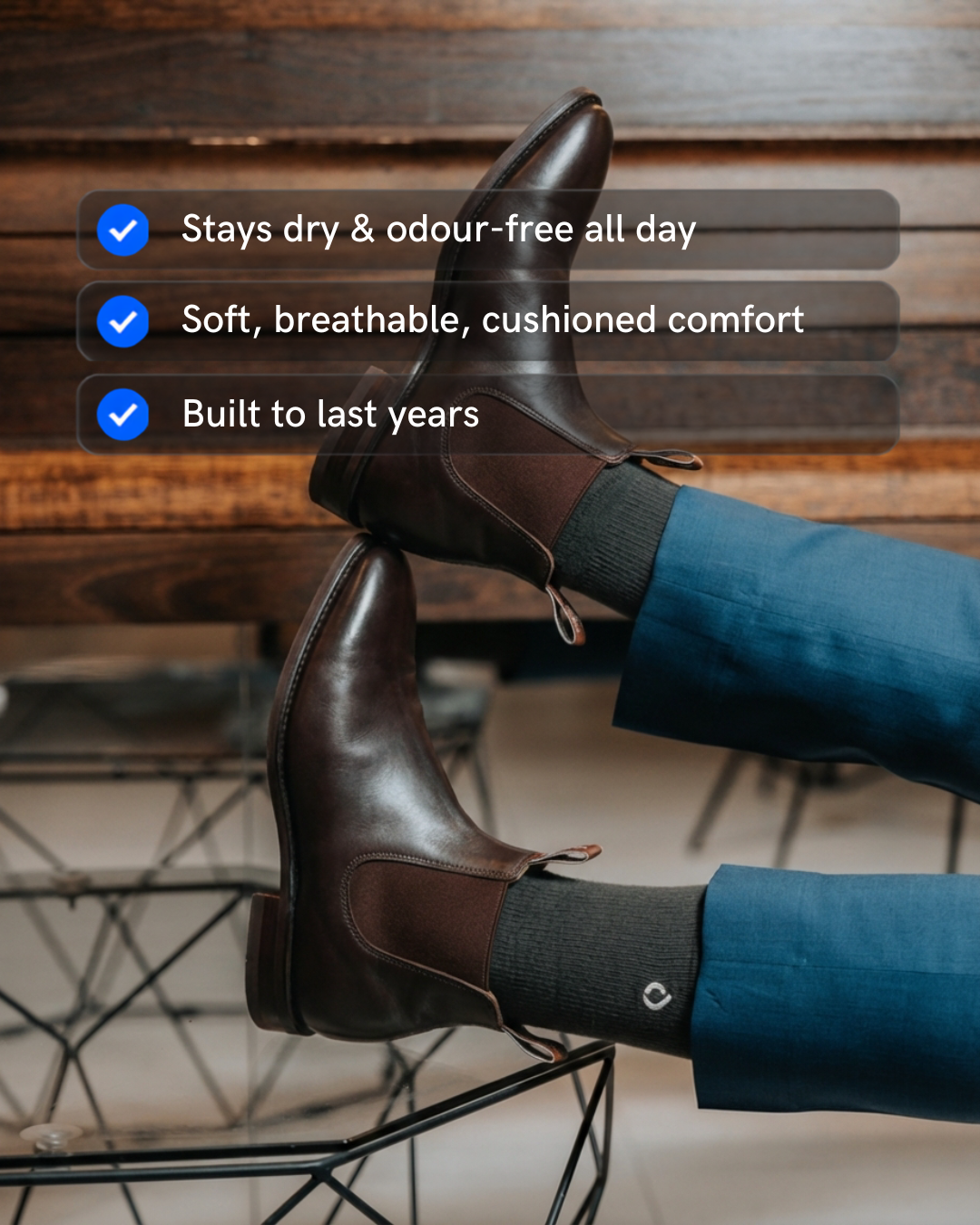 Man wearing DryStep dark grey crew socks at office — sweat-proof mens dress sock