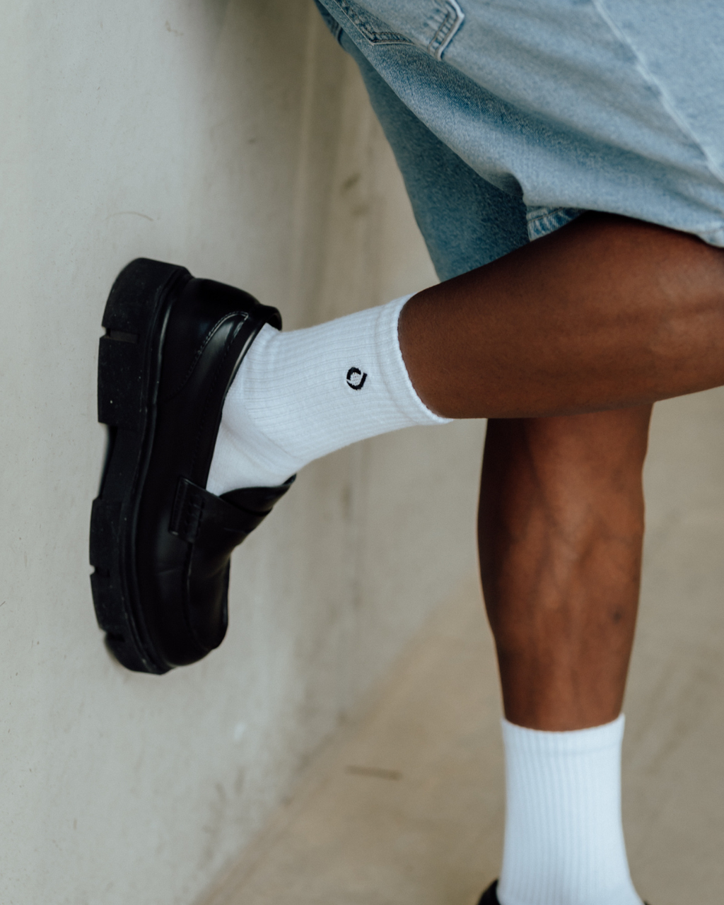 Man wearing DryStep white mid crew socks for lifestyle — smart-casual moisture-wicking sock