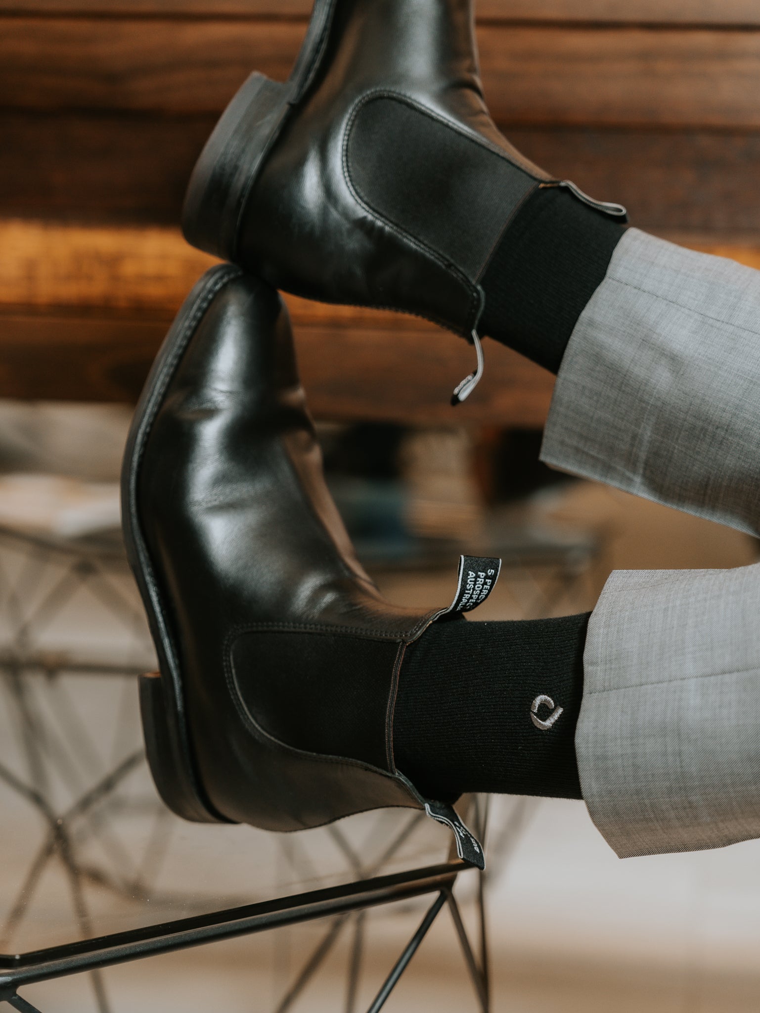 Man wearing DryStep black crew socks at office in RM Williams boots — sweat-proof dress socks