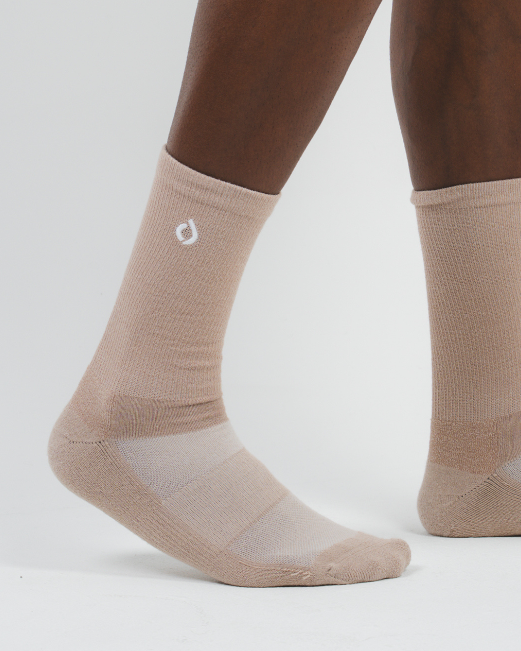 DryStep light mocha crew socks on foot — neutral performance dress sock for men