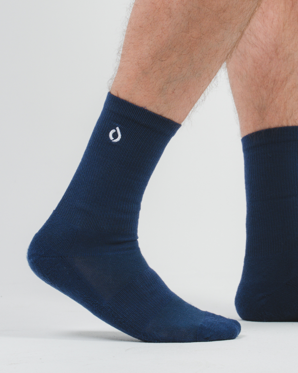DryStep midnight navy crew socks on foot — suit-ready office dress sock for men
