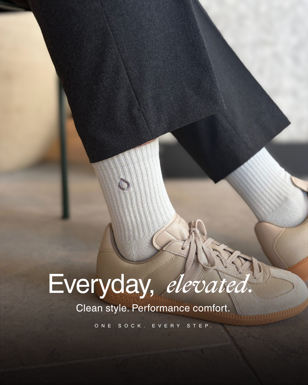 Mist grey mid-crew sock worn with black leather sneakers