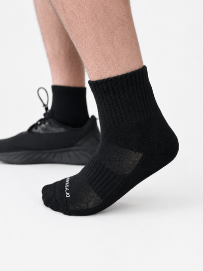DryStep black quarter-length athletic socks, studio product photo