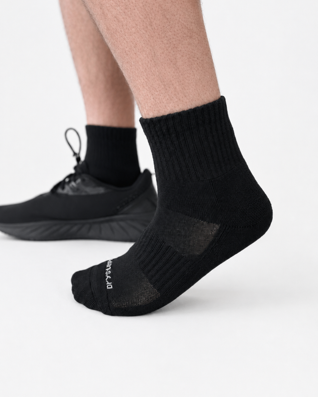 DryStep black quarter-length athletic socks, studio product photo
