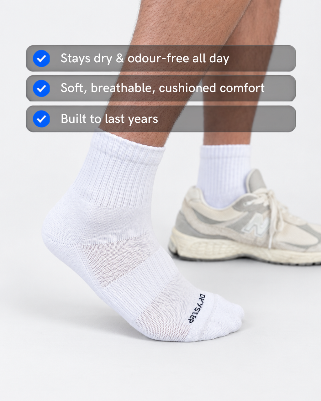 Man in DryStep white quarter socks with New Balance sneakers, dry and odour-free, built to last