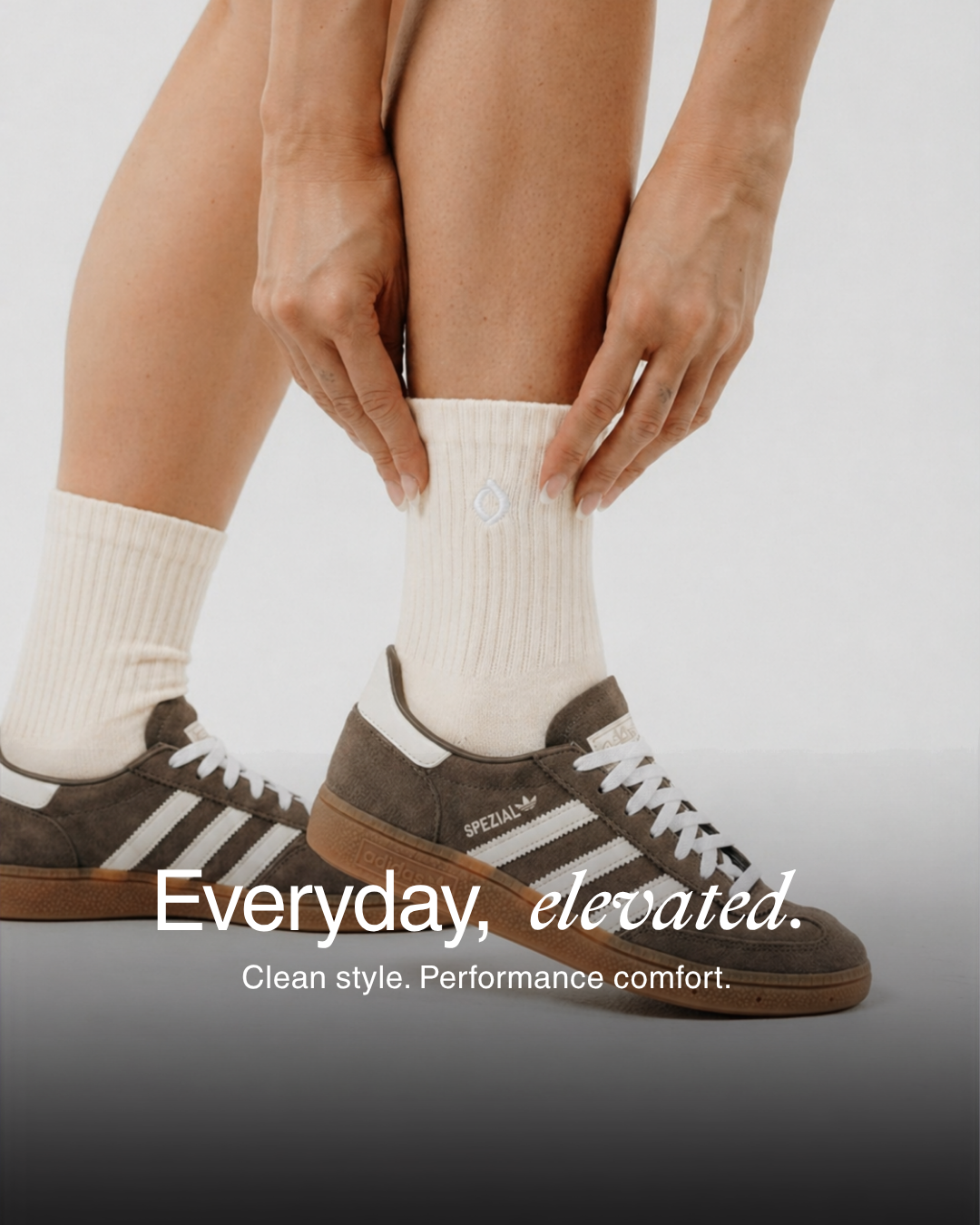 Vanilla mid-crew sock worn with black leather sneakers