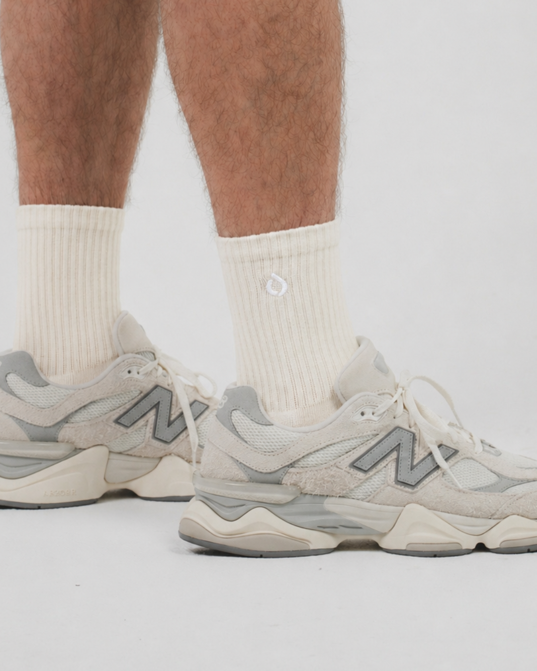 Person wearing DryStep vanilla mid crew socks at gym — moisture-wicking cushioned sport sock